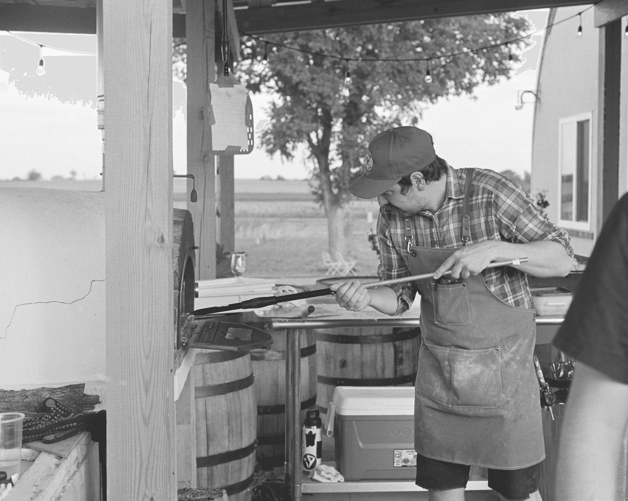 Ed Jr. baking pizzas